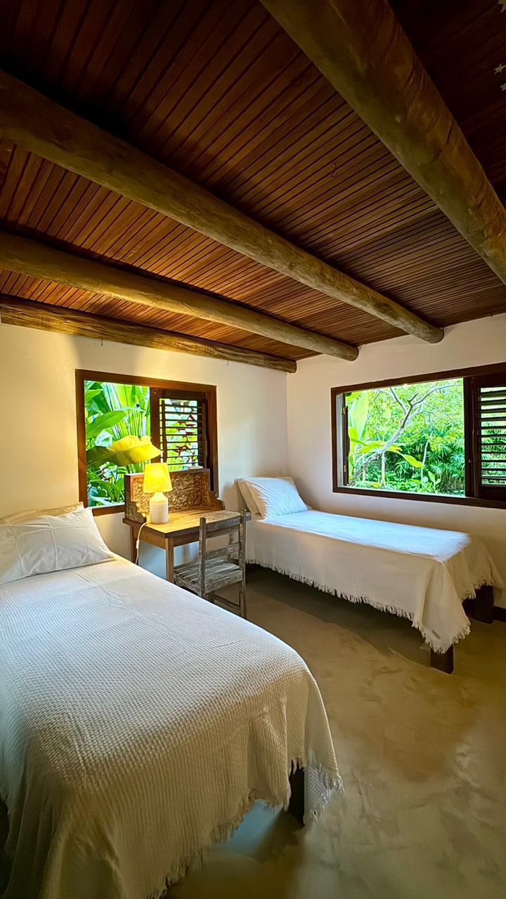 Quarto da Casa Jenipapo com duas camas de solteiro